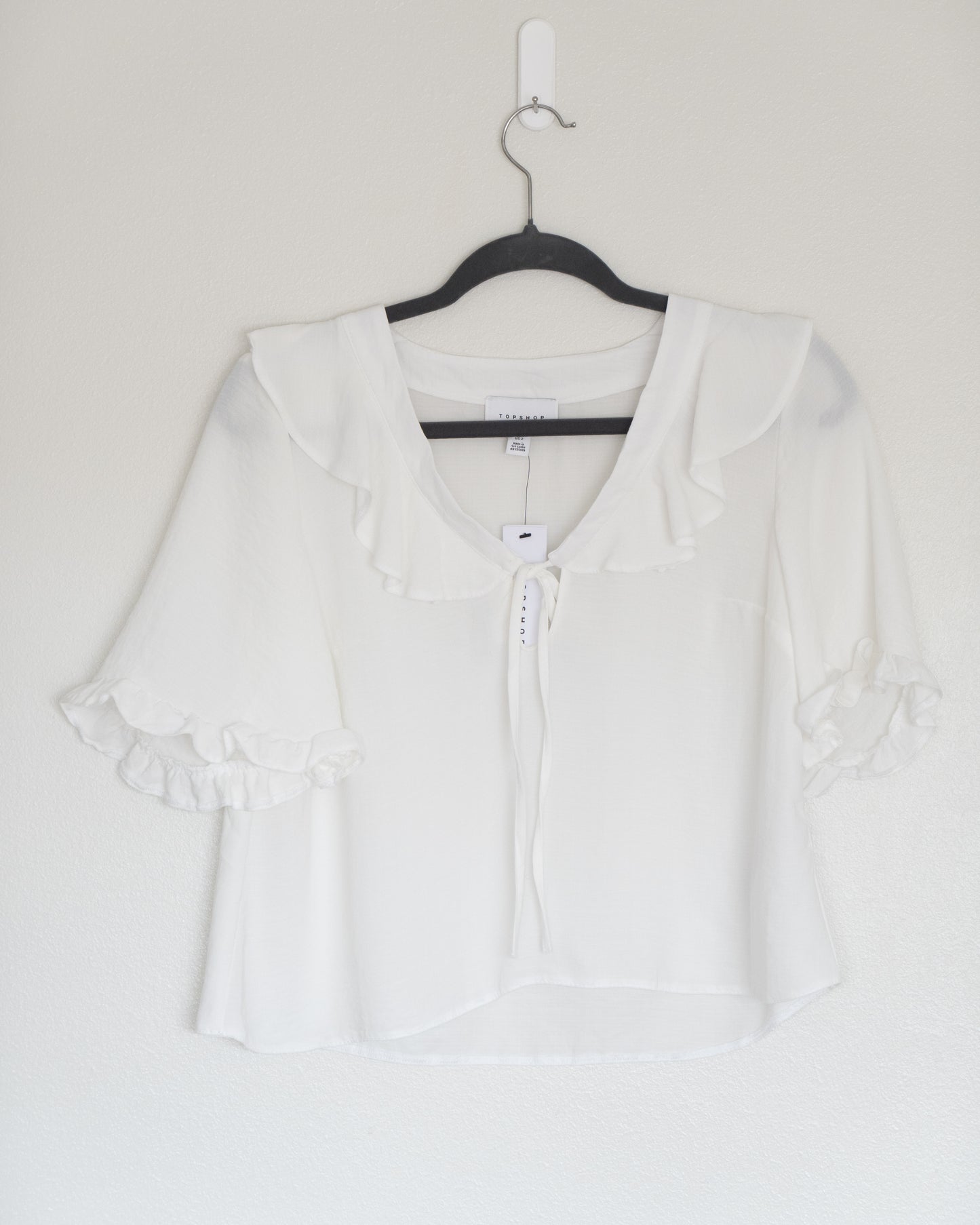 Blusa Blanca Lazo y Vuelos - Topshop - La Reversa