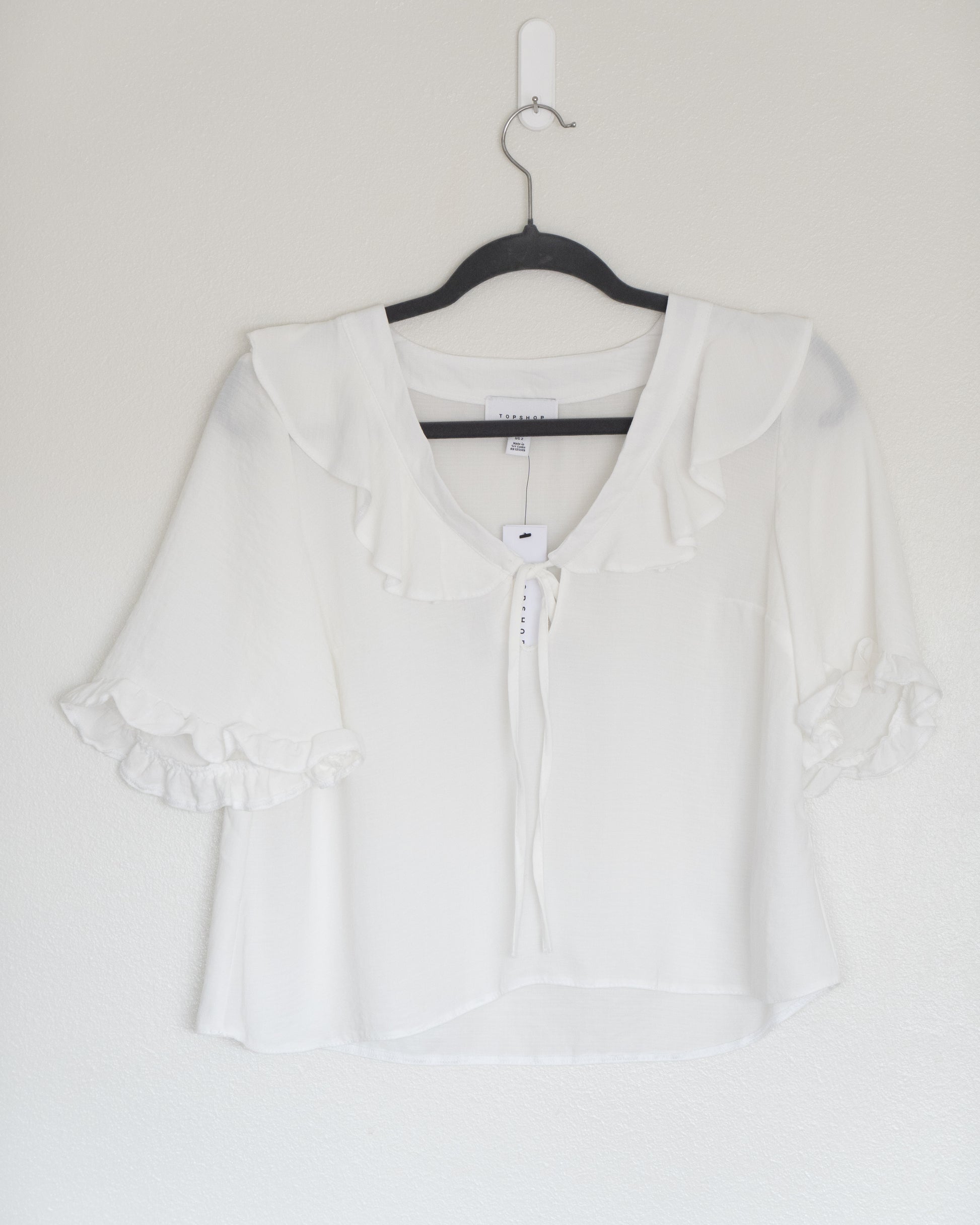 Blusa Blanca Lazo y Vuelos - Topshop - La Reversa