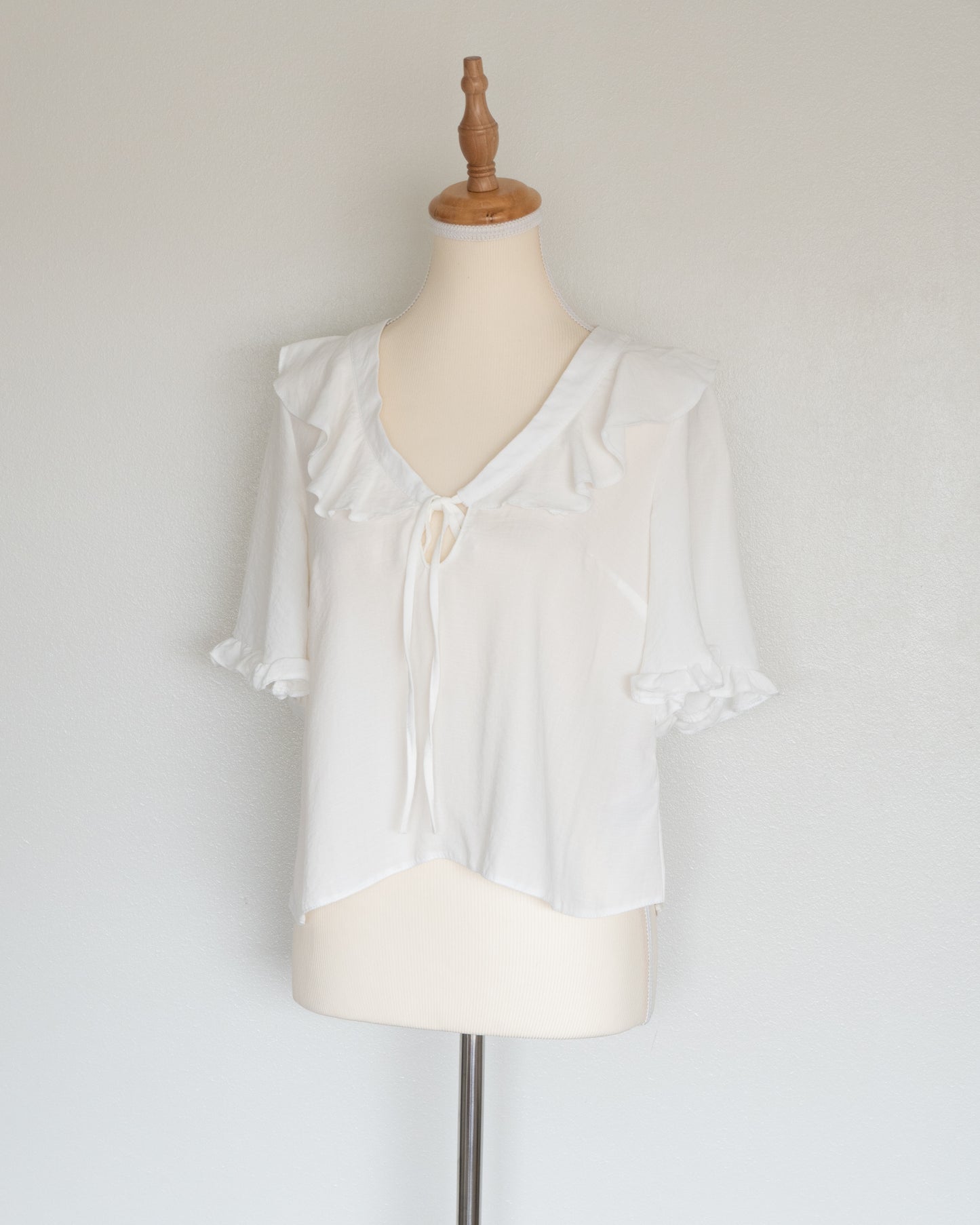 Blusa Blanca Lazo y Vuelos - Topshop - La Reversa